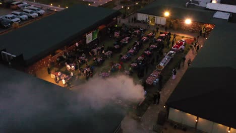 Aerial-view-of-a-traditional-arabian-dinner,-evening-in-Al-Ula,-Saudi-Arabia