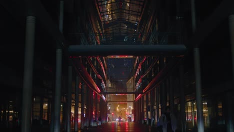 Man-walking-streets-of-Paris-at-night