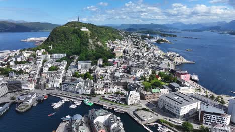 Drone-Shot-of-Alesund,-Norway,-City-on-Two-Islands,-Buildings-and-Harbor-60fps