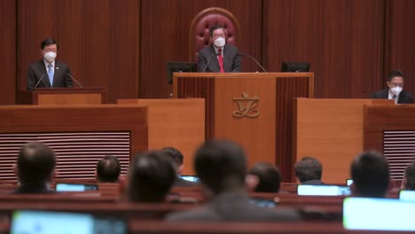 Lawmakers-listen-to-John-Lee-Ka-chiu-,-Hong-Kong's-chief-executive,-delivering-the-annual-policy-address-at-the-Legislative-Council-building-main-chamber-in-Hong-Kong