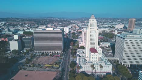 Los-Angeles-City-Hall---Drone-Flight-Over-City-Skyline---Palm-Trees-And-City-Streets