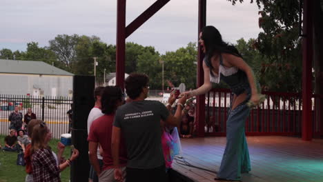 A-drag-queen-picks-up-tips-as-she-performs-at-the-MidMo-PrideFest