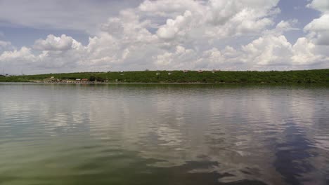 Huts-On-Forested-Coast-Of-Kazinga-Channel-In-Queen-Elizabeth-National-Park,-Uganda