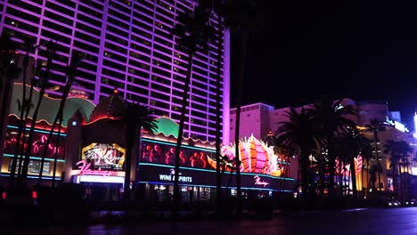 Las-Vegas-USA,-Night-Traffic-on-Strip-in-Front-of-Flamingo-Hotel-Casino-Resort,-Static-View