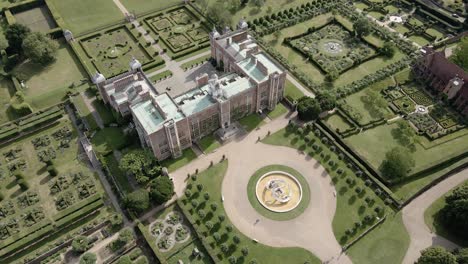 Aerial-View-Of-Public-Art-Renaissance-Fountain,-Gardens-Around-The-Hatfield-House-in-Hertfordshire,-England