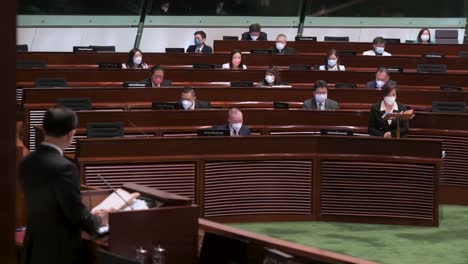 Lawmakers-are-seen-in-the-Legislative-Council-building-main-chamber-as-they-listen-to-John-Lee-Ka-chiu-,-Hong-Kong's-chief-executive,-delivering-the-annual-policy-address-in-Hong-Kong