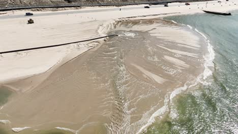 Sun-reflecting-off-the-waves-cresting-the-new-sand