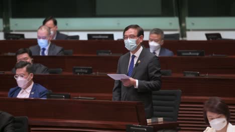 A-lawmaker-speaks-during-the-annual-policy-address-at-the-Legislative-Council-building-main-chamber-in-Hong-Kong