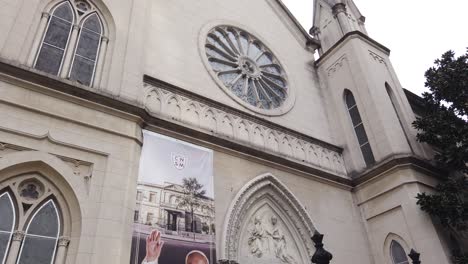 Pope-Francis-christian-leader-artwork-at-Argentine-church-entrance-building,-architecture-in-Buenos-Aires-City-of-famous-religious-personality