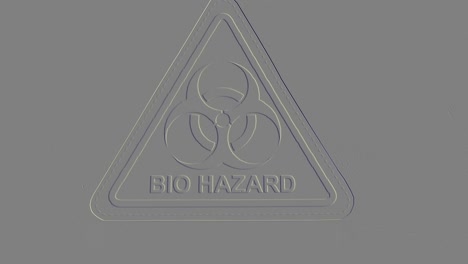 Zooming-towards-a-Biohazard-sign,-embossed-effect