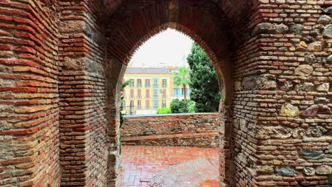 Alcazaba-castle-fortification-thick-walls-and-entrance-gate-Malaga-Spain