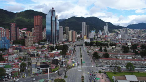 Drone-following-the-road-to-the-Bogota-city-center,-mostly-cloudy-day-in-Colombia