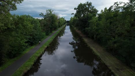 drone-shot-going-backward-revealing-Roanne-Digoin-canal-in-Loire-ad-Saone-et-Loire-Department,-french-countryside,-auverge-rhone-alpes-region