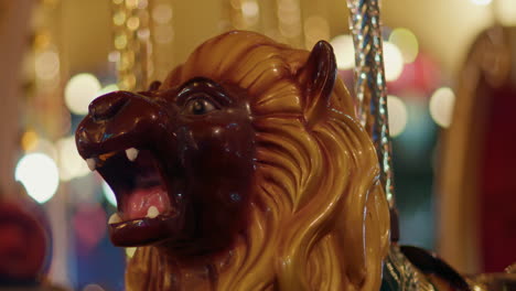 Detailed-closeup-shot-of-painted-lion-animal-head-on-carousel-ride