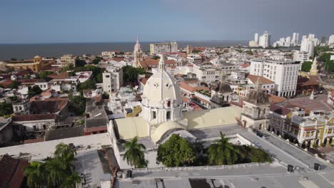 Church-of-San-Pedro-Claver-in-Cartagena-Colombia-on-sunny-day,-aerial-orbit