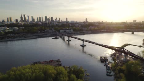 Sunset-over-Vistula-river-with-city-skyline-of-Warsaw-Poland-off-in-the-distance