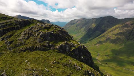 Aerial-view-of-Glencoe-mountain-range-in-the-Scottish-Highlands,-Scotland,-United-Kingdom