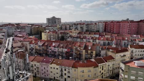 Drone-shot-flying-over-the-roofs-in-Lisbon