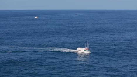 Fishing-Boat-Cruising-In-The-Blue-Sea-In-To-Muxia-In-Spain