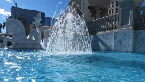 Small-Fountain-on-Las-Vegas-Strip-on-Sunny-Day,-Part-of-Caesar's-Palace-Casino-Hotel-Complex