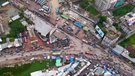 Motorbikes,-Tuk-tuks-And-Bus-In-The-Road-Near-Rupatoly-Bus-Terminal-In-Barisal,-Bangladesh