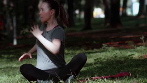 Woman-Streches-Sitting-Outdoors,-Hethy-Lifestyle-Concept