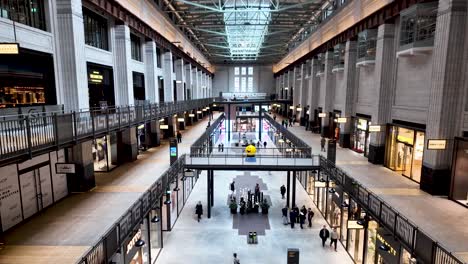 The-Turbine-Halls-within-Battersea-Power-Station,-London,-array-of-shops,-complemented-by-a-vibrant-food-hall-boasting-diverse-dining-options-and-opportunities-for-socializing-and-engagement