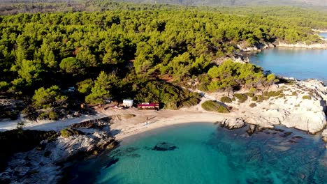 Beach-surrounded-by-rocks-in-the-morning-light