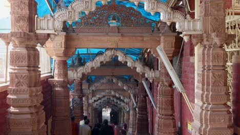 Osiyan-sacchiyay-Mata-Temple,-jodhpur,-rajasthan,-India---Feb-21-2024:-ancient-hindu-temple-artistic-entrance-gate-at-day-from-flat-angle