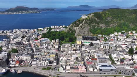 Aerial-View-of-Alesund,-Norway,-Picturesque-Port-Town,-Buildings,-Street-Traffic,-Islands-and-Bay,-Drone-Shot-60fps