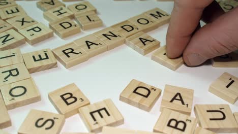 Crossword-with-RANDOM-and-DATA-in-Scrabble-tile-letters-on-table-top