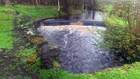 Cascading-waters-of-Clarinbridge-River,-bubbling-near-Athenry-Castle