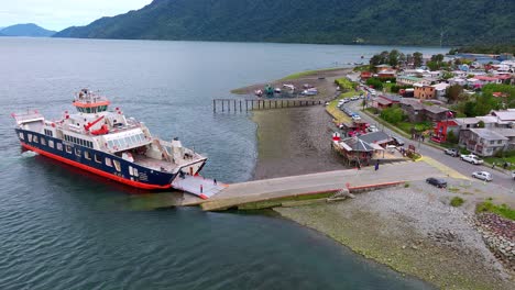 Aerial-View-Of-Ferry-Boat-Docked-At-Ramp-In-Hornopiren-Town-Located-In-Commune-Of-Hualaihué-in-Palena-Province,-Southern-Chile