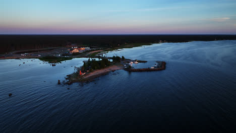 Aerial-view-around-the-Keskuskari-island,-sunny-evening-in-Kalajoki,-Finland