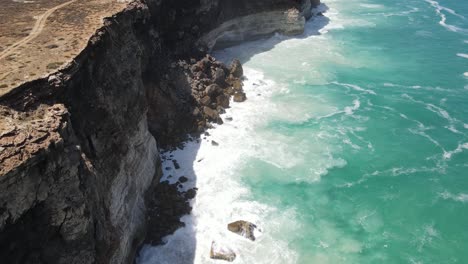 Drone-aerial-rising-forward-over-the-Great-Australian-Bight-with-waves