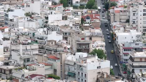 Luftaufnahme-Des-Stadtzentrums-Von-Athen,-Panoramablick-Auf-Gebäude-Und-Allee-Mit-Autos