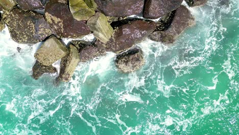 Looking-down-at-the-rocks-next-to-the-Cudgen-Headland-near-Kingscliff-in-New-South-Wales-in-Australia