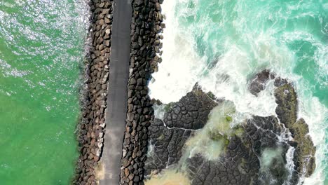 Looking-down-at-the-rock-wall-adjacent-to-the-Cudgen-Headland-near-Kingscliff-in-New-South-Wales-in-Australia