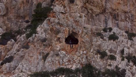 Vlogger-sits-in-Cave-Above-Balos-Beach