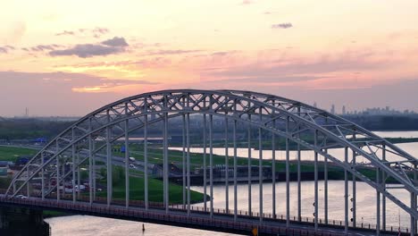 Sunset-Over-Arched-Bridge-Across-The-River-Noord-Near-Alblasserdam,-Holland,-Netherlands