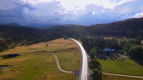 Aerial-shot-of-Crackenback-over-the-Alpine-Way-road-on-a-warm-sunny-summer's-day-in-New-South-Wales,-Australia