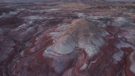 Aerial-4k-drone-circle-view-of-Bentonite-Hills,-Utah,-at-golden-hour-colorful-mars-like-landscape