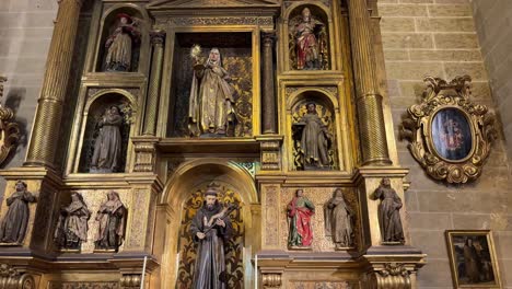 Catholic-religious-sculptures-Virgin-Mary-apostles-Malaga-cathedral-Spain