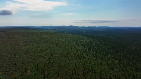 Aerial-view-over-fells-and-boreal-wilderness,-summer-in-Saariselka,-Lapland