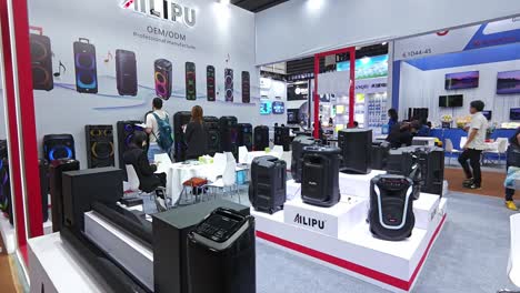 Exhibition-booth-with-consumer-electronics-loud-speakers-at-Canton-import-and-export-fair,-Guangzhou,-China