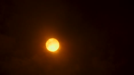 Clouds-moving-in-front-of-the-sun-on-a-cloudy-day