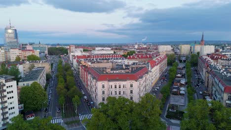 Szczecin-City-infrastructure-with-busy-roads,-aerial-panorama-view