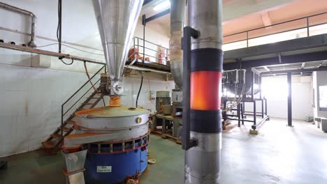 pov-shot-Chilies-are-being-systematically-crushed-in-a-chilly-power-plant