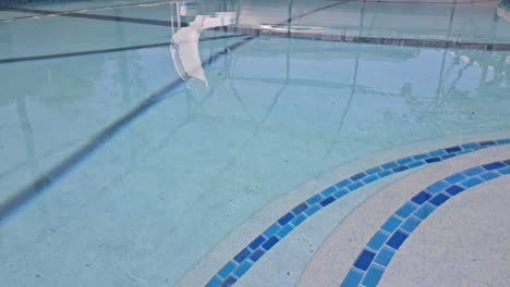 Static-shot-of-pool-steps-with-slide-reflection,-Florida