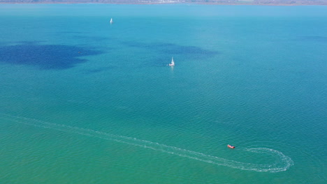 Aerial-flying-over-Isle-of-Wight-sea-and-boats-Sunny-day-UK-4K